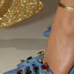 Colorful Rhinestone Gem-Embellished Bow Pump In Denim