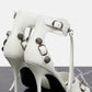 Studs And Buckles Embellished Metallic Crinkled Ankle Heeled Sandals - White